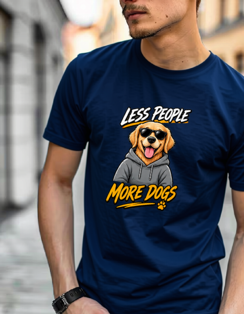 A man wearing a navy blue t-shirt with a cartoon graphic of a golden retriever dog wearing sunglasses and a gray hoodie, with the text 'LESS PEOPLE MORE DOGS' in white and yellow.